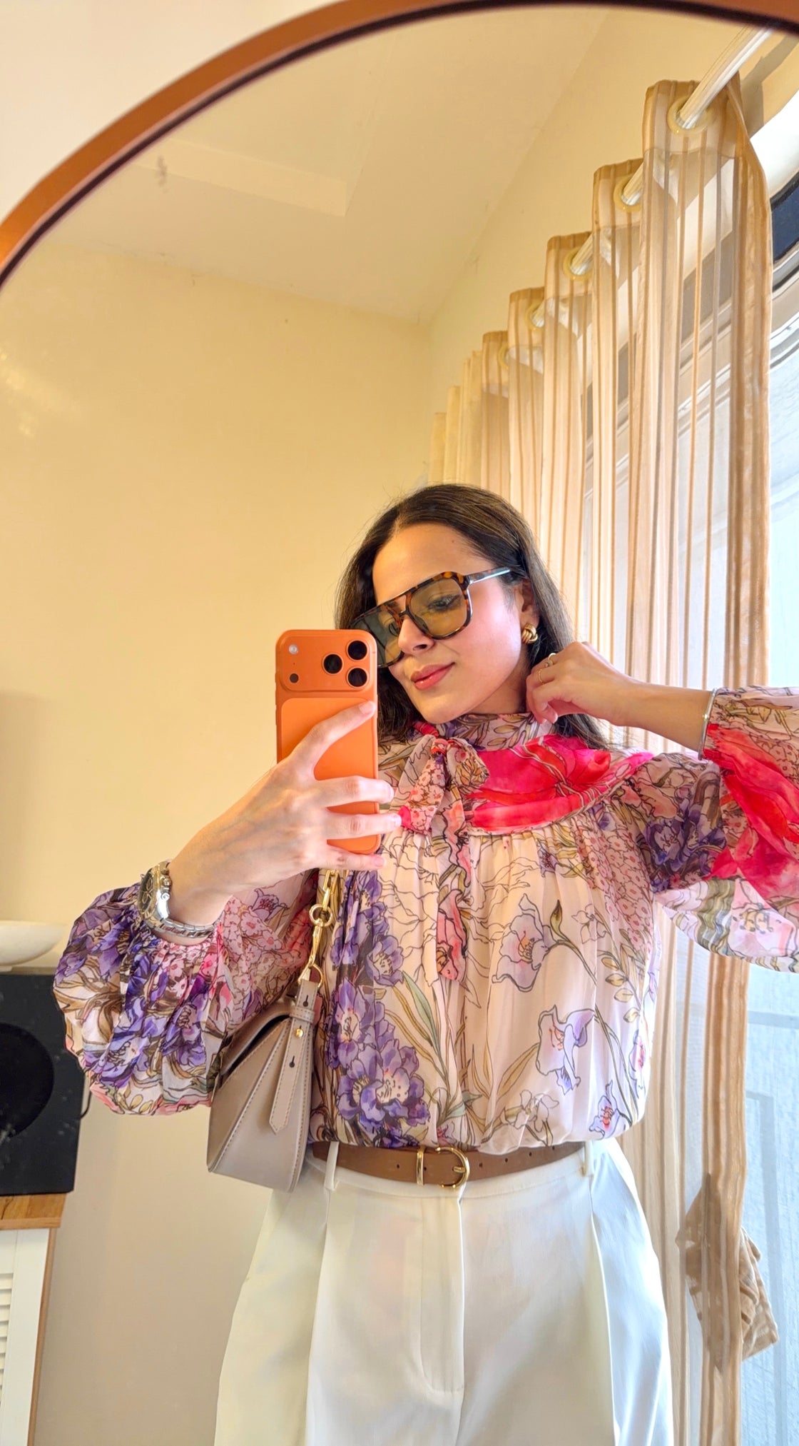 Floral patterned blouse with pink and purple flowers